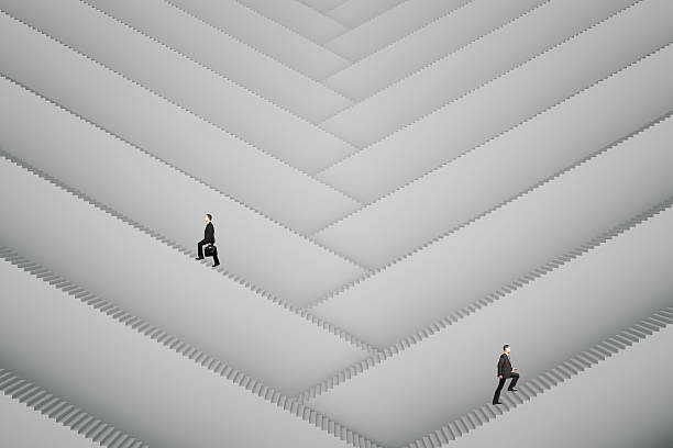 istock Businesspeople climbing stairs 615283376