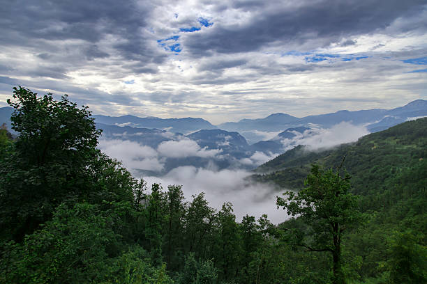 istock High mountains and clouds, beautiful nature landscape 615283388