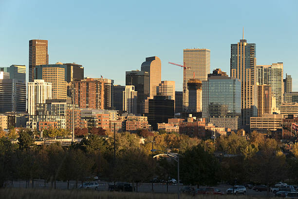 istock Downtown Denver Colorado sunset skyscrapers construction crane city scape 615283818
