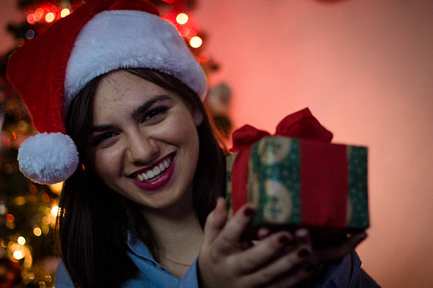 istock Christmas Girl with Gift 615284586