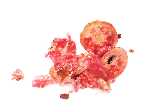 istock Eaten pomegranate remains and lumps 615286794