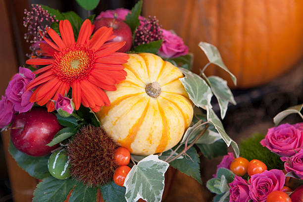 istock Flower arrangement with miniature pumpkin 615287502