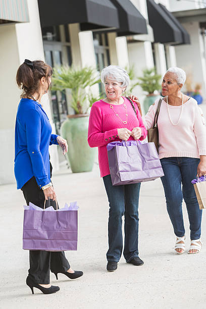 istock Three multi-ethnic senior women out shopping 615288106