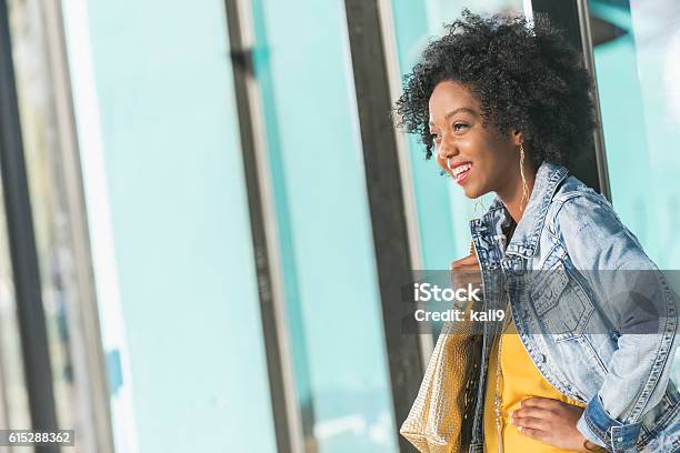 Young mixed race African American woman standing outside