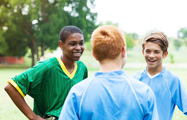 istock Soccer players discuss game 615387266