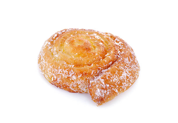 istock coconut bun roll swirl on white background 615387270