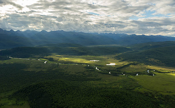 istock Evening rays on Kronotsky Nature Reserve in Kamchatka Peninsula. 615387418