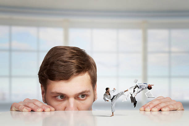 istock Business conflict and confrontation . Mixed media 615389942