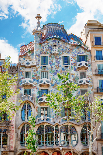 Barcelona, Spain - 18 April, 2016: The facade of the house Casa Battlo or thr house of bones designed by Antoni Gaudi with his famous expressionistic style