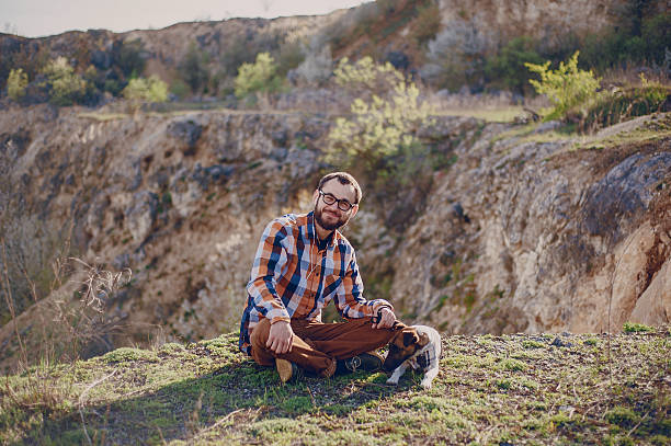 istock The guy with the dog 615393066