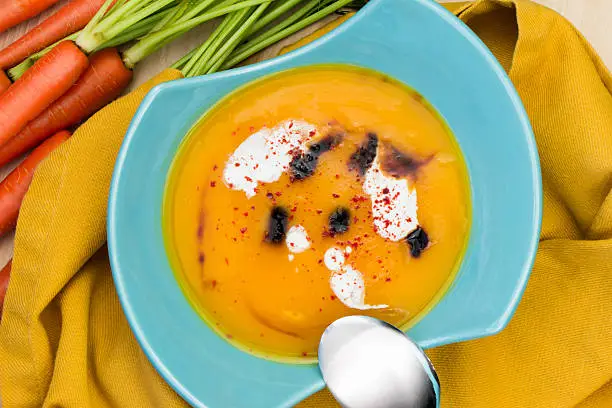 Hot carrot soup with spices made from fresh farm products. Organic carrots.
