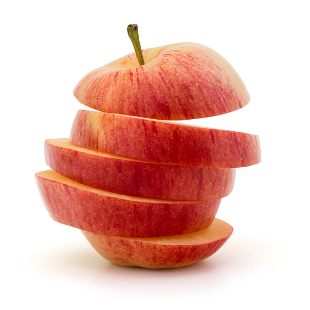 istock Red sliced apple isolated on white background cutout 615394676