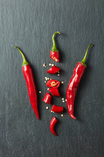istock Chilean red pepper slices and seeds 615396080
