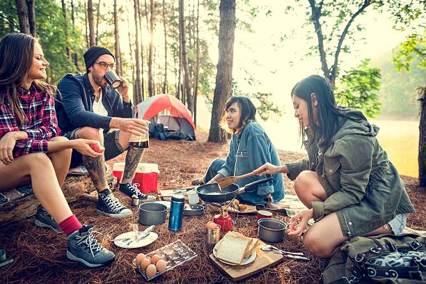 istock Friends Camping Eating Food Concept 615398308