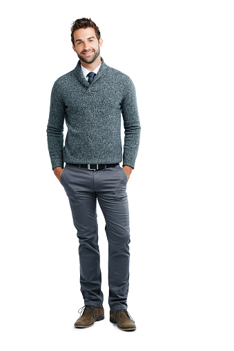 Studio portrait of a happy businessman posing against a white background