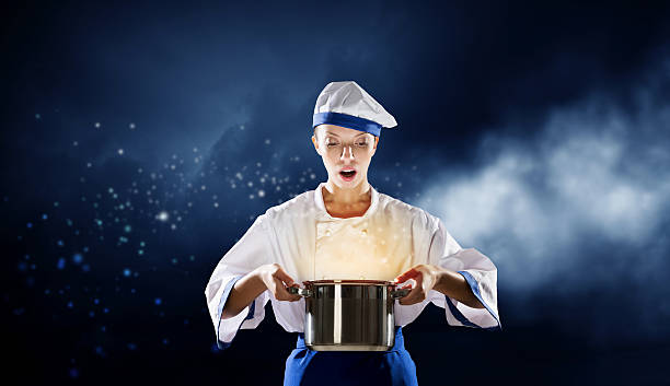istock She is magician as cook . Mixed media 615400346