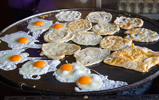 istock Rotee : traditional Muslim food on hot pan 615400646
