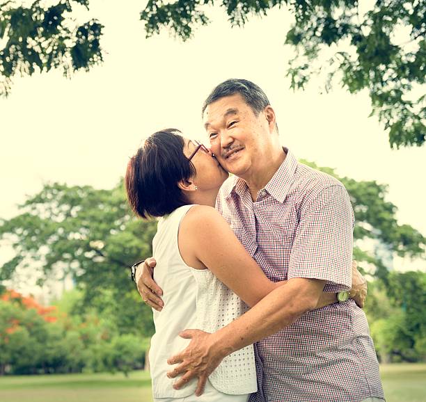 istock Senior Couple Leisure Outside Concept 615401060