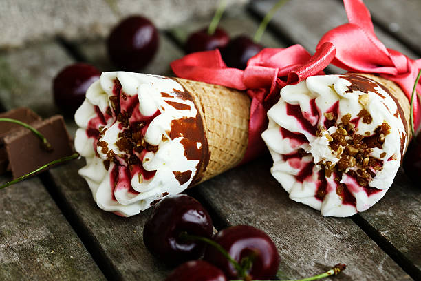 istock Cherry vanilla ice-cream with caramel topping. Closeup 615401868