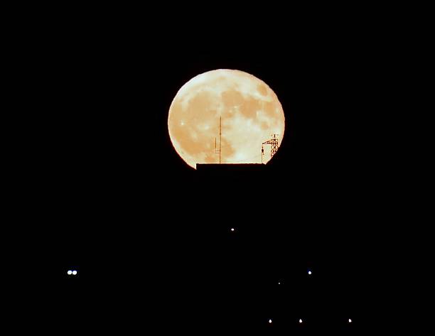 istock Moon over the City 615402572