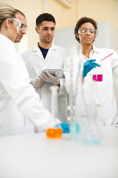 istock Group of people in a laboratory 615403390