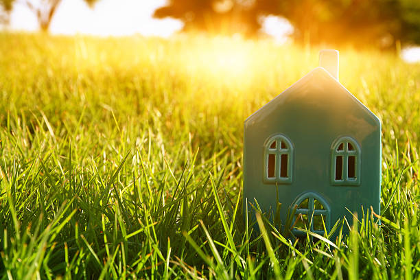 istock vintage house in the grass at sunset light 615405130