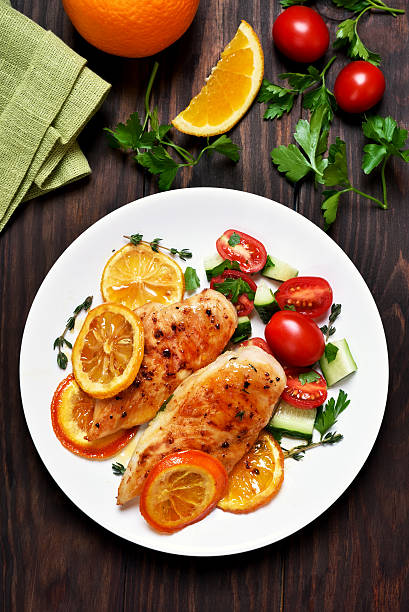 istock Chicken breast with orange sauce 615405808