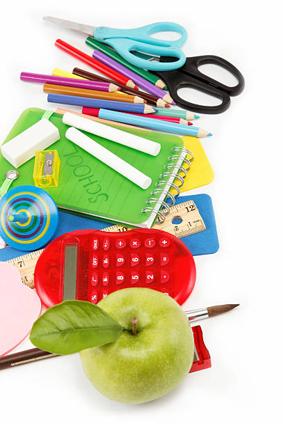 istock School and office supplies on white background. Back to school. 615406152