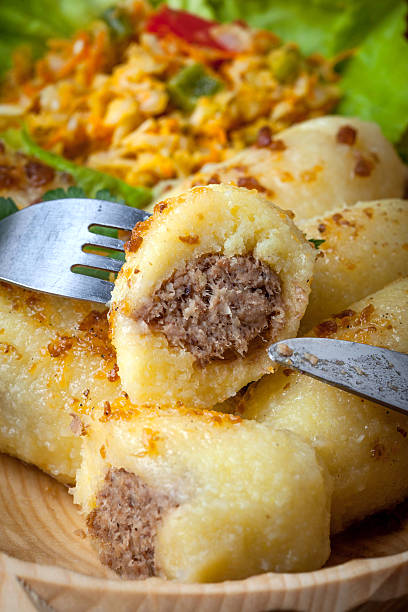 istock Potato dumplings stuffed with minced meat. 615406580