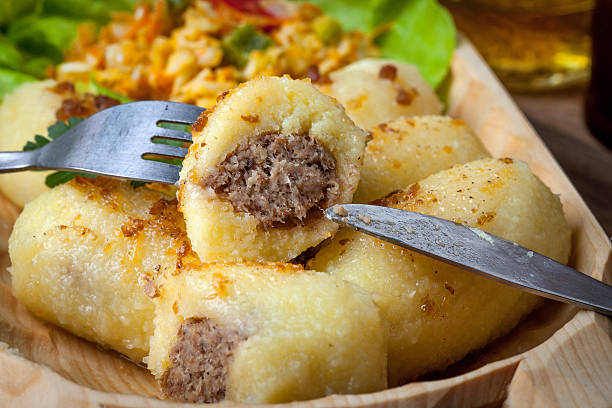 istock Potato dumplings stuffed with minced meat. 615406620