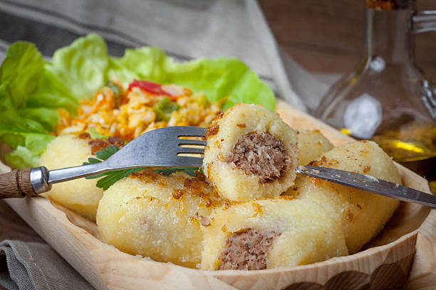 istock Potato dumplings stuffed with minced meat. 615406654
