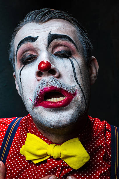 istock Terrible crazy clown and Halloween theme 615409380