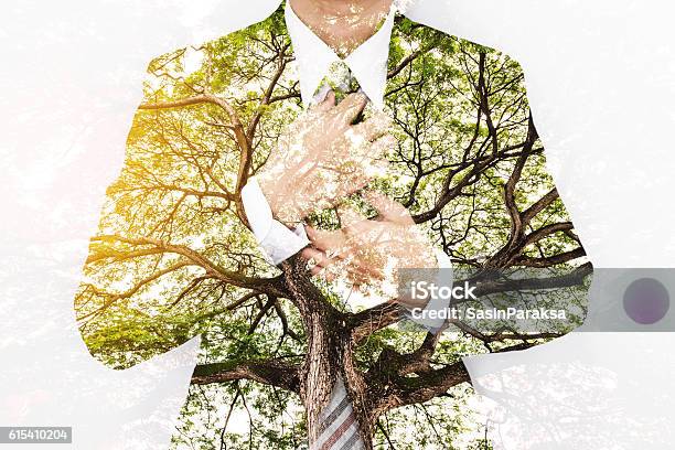Double Exposure Businessman In Suit With Big Tree Stock Photo - Download Image Now - Sustainable Resources, Multiple Exposure, Leadership