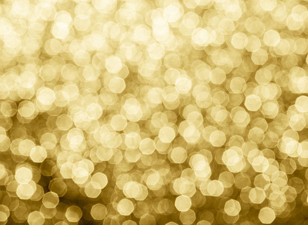istock gold abstract background bokeh circles for Christmas background. 615410682