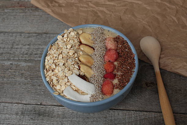istock Breakfast smoothie bowl topped with raspberries 615413458