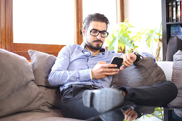 istock Man consult his smartphone 615413514