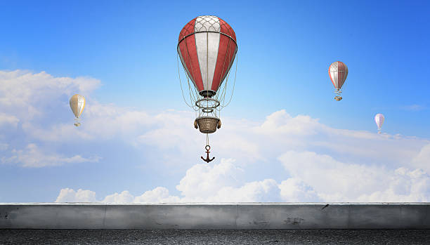 istock Aerostats flying over sky . Mixed media 615413692