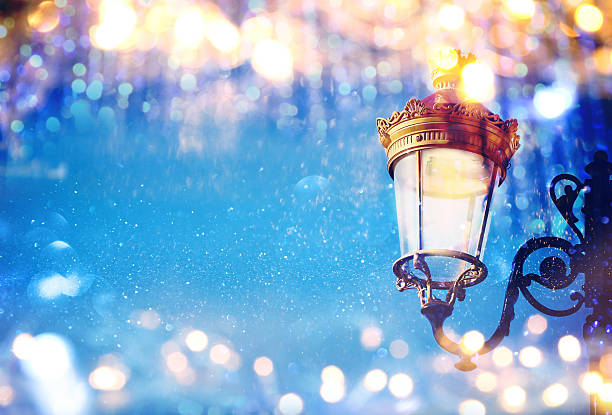 istock Abstract image of Christmas street lights with glitter overlay 615414092
