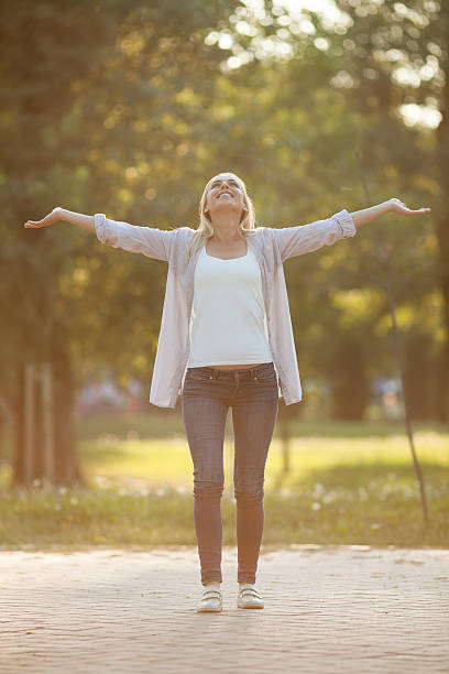 istock Woman in park 615414590