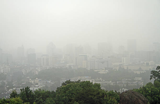 istock smog in chinese city Hangzhou 615414762