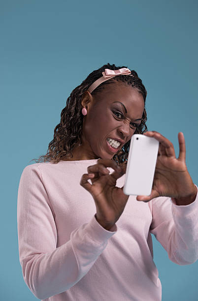istock Pretty woman smartphone 615415700