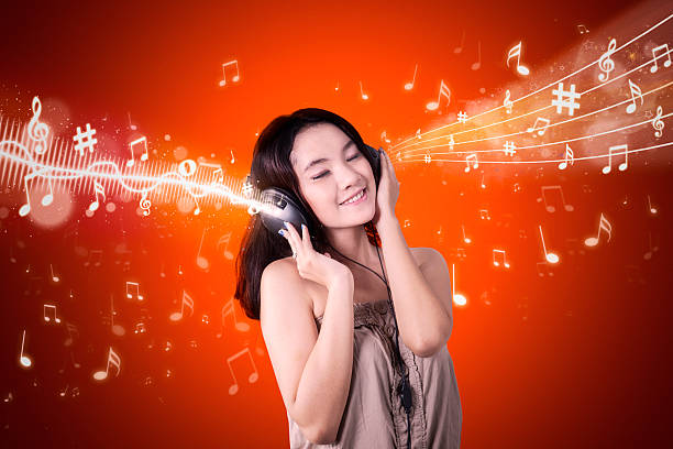 istock Young woman and musical note 615417608