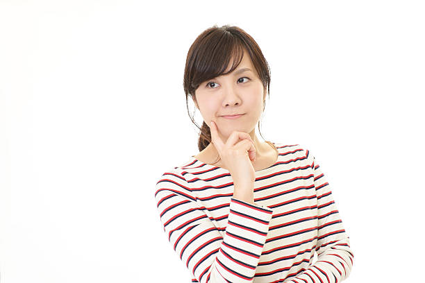 istock Uneasy Asian woman 615419018