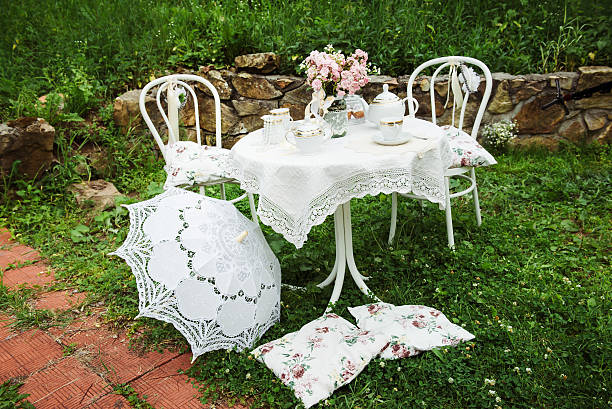 istock picture of a cute table with tableware for a tea 615420734