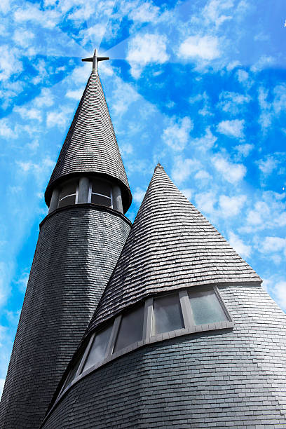 istock Wooden church with some glow 615421758