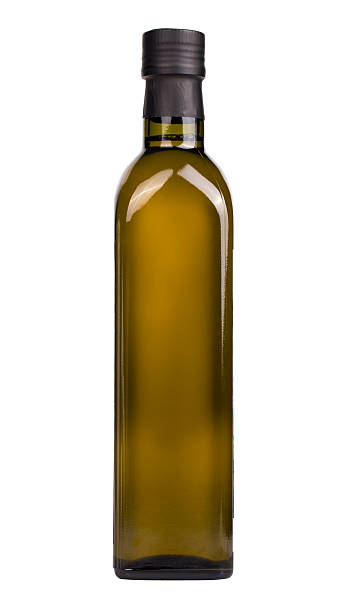 botella de aceite de oliva aislada en el blanco - aceite de oliva fotografías e imágenes de stock