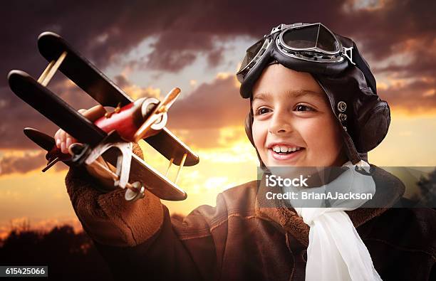 Boy Playing With Wooden Toy Airplane Stock Photo - Download Image Now - Piloting, Child, Pilot