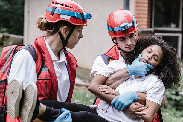 istock Paramedics evacuating victim after natural disater 615425508