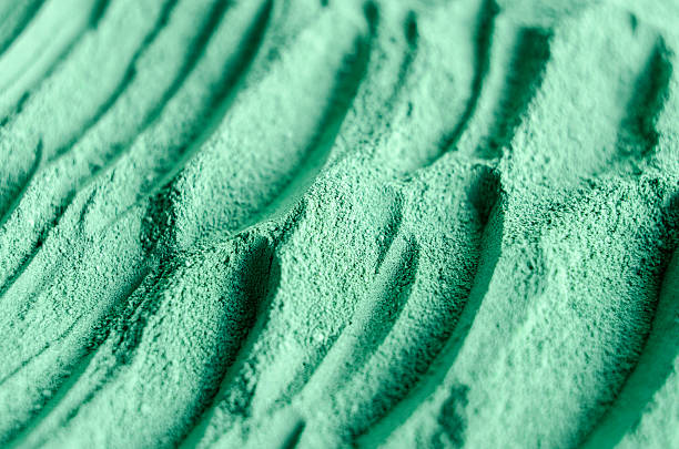Green cosmetic clay powder texture