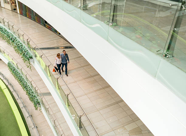 istock Couple walking at the shopping center 615426718